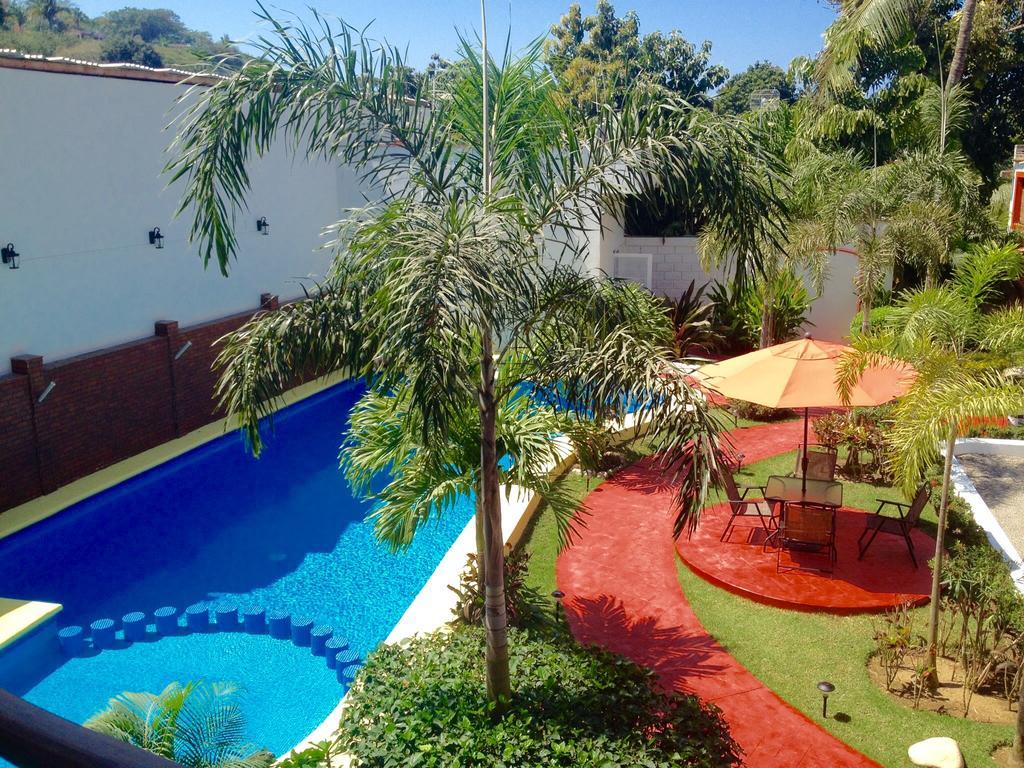 Hotel Y Suites Los Encantos Саюлита Экстерьер фото